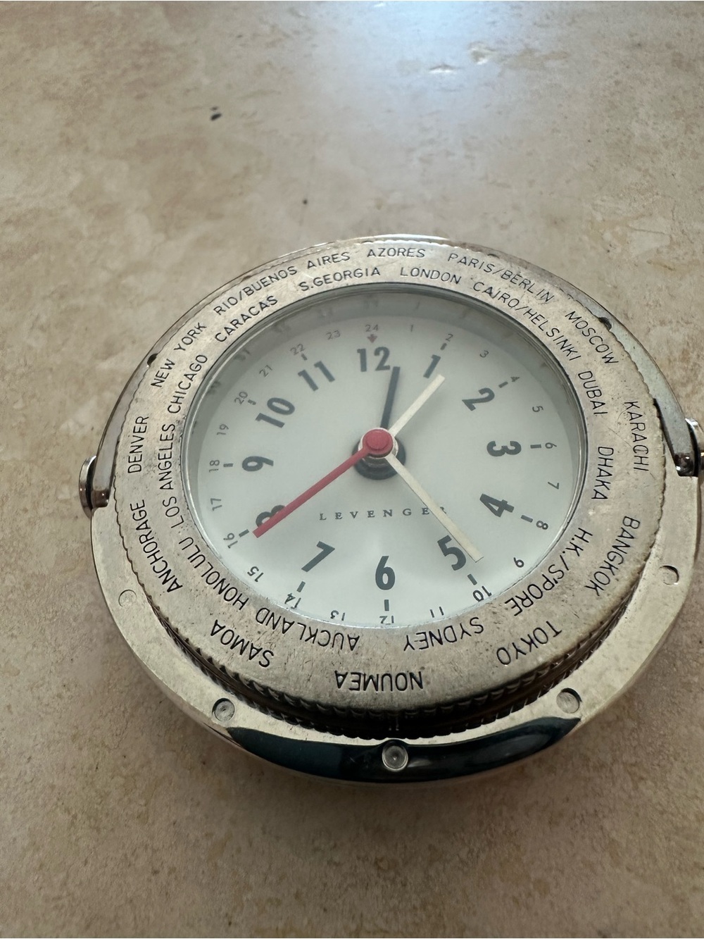Vintage levenger clock with white dial